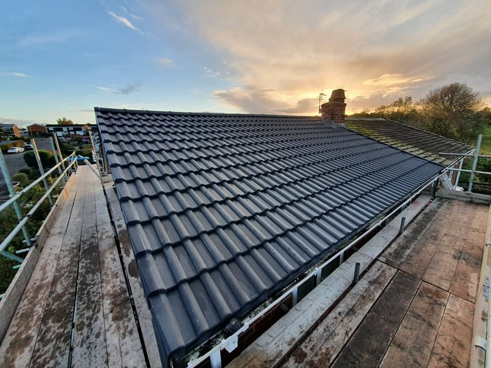 Newly tiled pitched roof completed by A&S May Roofing in the North East